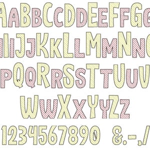 May include: A yellow and pink alphabet with a checkered pattern. The letters are in a bold, cartoon-like font. The numbers 1 through 9 and 0 are also included, along with the symbols ampersand, hyphen, period, and slash.