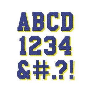 May include: Blue and yellow embroidered letters, numbers, and symbols, including A, B, C, D, 1, 2, 3, 4, ampersand, pound sign, question mark, and exclamation point.