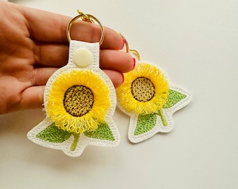 Sunflower key fob snap tab and eyelet sunflower keychain in the hoop machine embroidery designs ITH project flower fluffy fuzzy sunflower