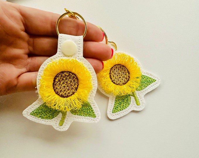 Sunflower key fob snap tab and eyelet sunflower keychain in the hoop machine embroidery designs ITH project flower fluffy fuzzy sunflower