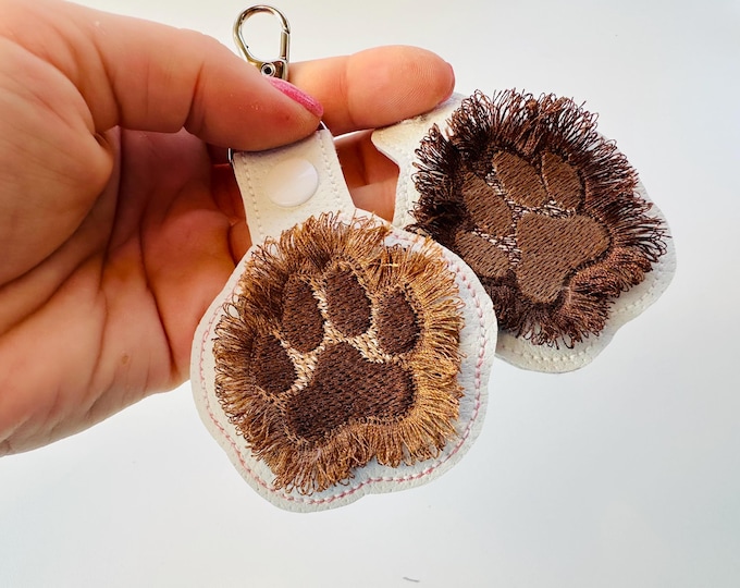Fringed Dog Puppy Paw Eyelet and Key Fob Snap Tab in the hoop machine embroidery designs ITH project key ring keychain fluffy fur cute Paw