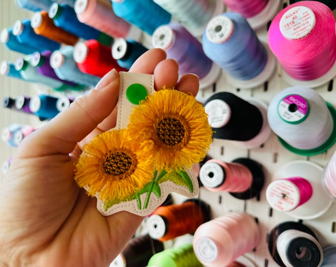 Sunflower key fob snap tab and eyelet sunflower keychain in the hoop machine embroidery designs ITH project flower fluffy fuzzy sunflower