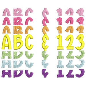 May include: A set of colorful embroidered letters and numbers. The letters are "ABC" and the numbers are "123". The letters and numbers are in a rainbow of colors, including pink, orange, yellow, green, blue, and purple.