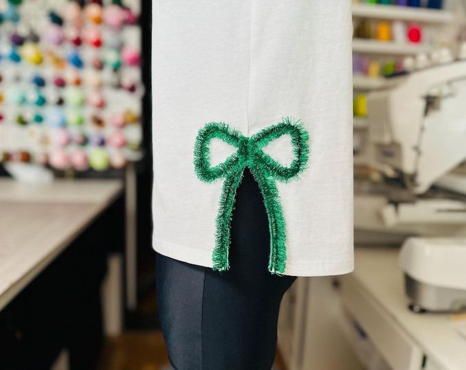 Fringed side seam Bow simply fringe in the hoop machine embroidery designs thin narrow fluffy ribbon Girly heirloom Bow slit seam sweatshirt