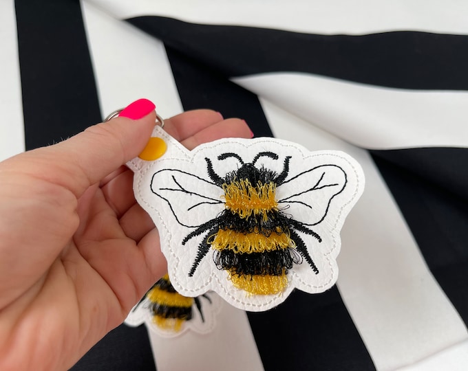 Bumblebee keychain embroidery in the hoop Bee embroidery project Fringed bees key fob snap tab machine embroidery designs ITH project keytab