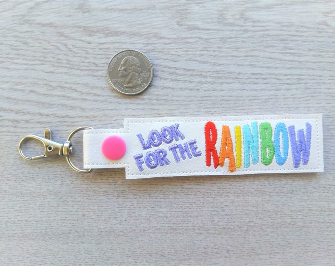 Look for the Rainbow ITH in the hoop key fob snap tab machine embroidery design, snap tab keyfob feltie keychain key chain bag tag pattern