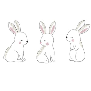 Puede incluir: Tres conejos blancos con narices rosas y orejas verdes. Los conejos están en diferentes poses, uno está sentado, otro está de pie y otro está mirando hacia un lado.