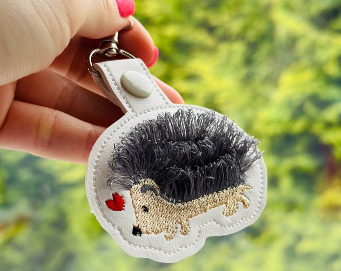 Fringed Hedgehog Eyelet and Key Fob Snap Tab in the hoop machine embroidery designs ITH project key ring fluffy fur animal kids backpack tag