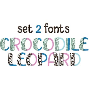 May include: A white background features the text "set 2 fonts" in brown. Below, the words "CROCODILE" and "LEOPARD" are displayed in a playful font, with animal print and colourful accents. The letters are in blue, pink, and green.