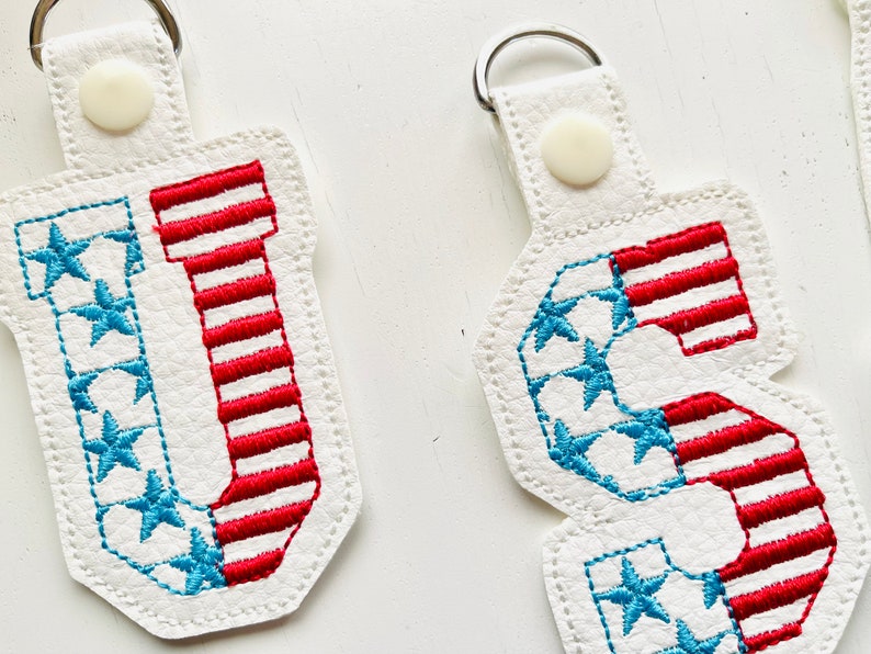 Patriotic 4th July American flag alphabet letters Key Fob Snap Tab ITH in the hoop machine embroidery designs for hoop 4x4 and 5x7 keychain project by Artapli embroidery formats PES HUS JEF EXP DST VIP VP3 XXX instant download
