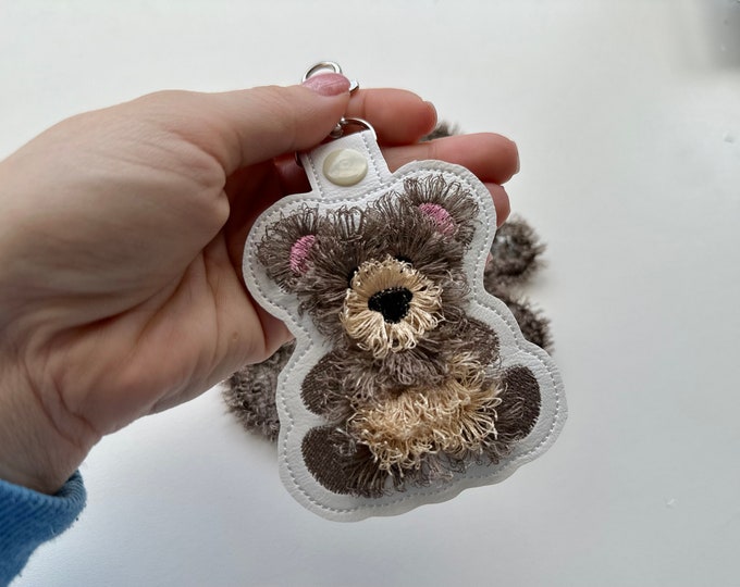 Fringed Bear Eyelet and Key Fob Snap Tab in the hoop machine embroidery designs ITH project key ring keychain fluffy fur animal kids bag tag