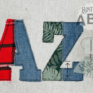 May include: A close-up of two fabric letters, A and Z, made from different patterned fabrics. The letter A is made from red plaid and blue denim. The letter Z is made from green leafy fabric and blue denim. The letters are sewn together on a white canvas background. The text "Entire ABC" is visible in the upper right corner of the image.