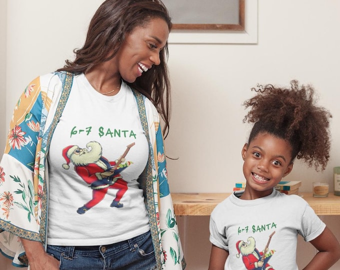 Featured listing image: 6-7 Santa Guitar Playing Santa T-shirt | Rocking Christmas Tee