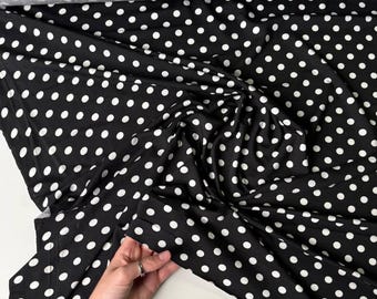 Italian Elegant viscose Jersey |  Polka dot print on black background |
