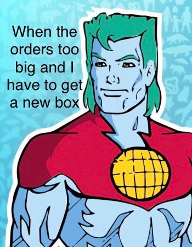 May include: Cartoon image of a superhero with green hair, blue skin, and a red top. The superhero has a yellow globe emblem on the chest. Text reads: "When the orders too big and I have to get a new box."