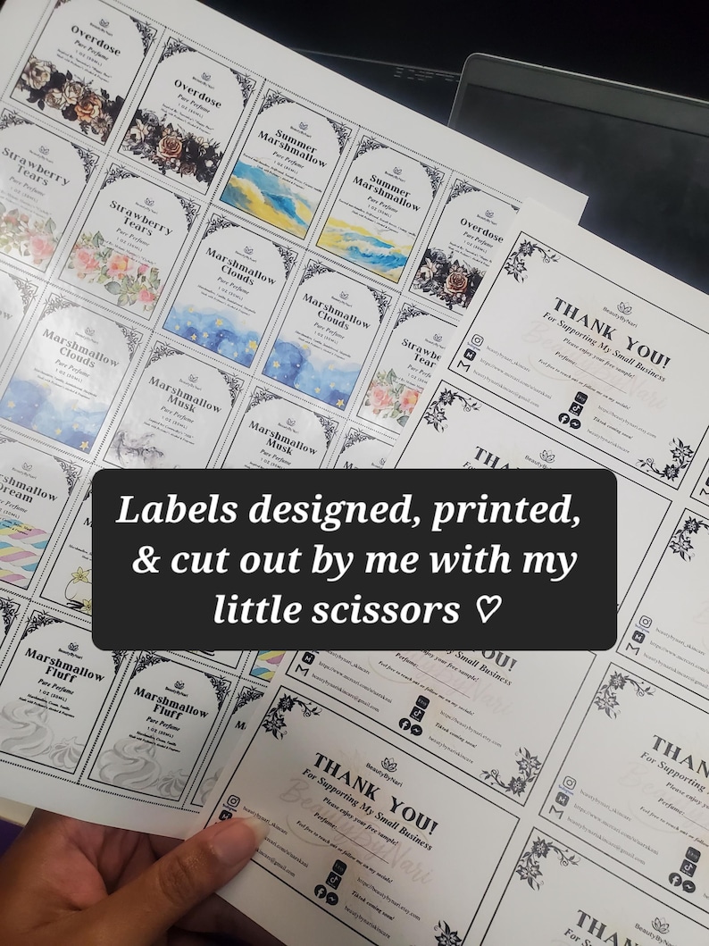 May include: A sheet of printed perfume labels with various designs and text, including "Overdose," "Strawberry Tears," and "Marshmallow Clouds." The labels are arranged on a white background. The image also includes "Thank You" cards.