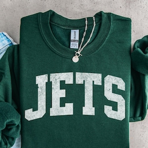 Jets Sweatshirt Distressed Print Sweatshirt: Vintage Football Crewneck