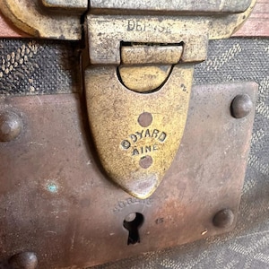 Unique 1930s vintage steamer trunk with leather body and original fabric interior *in the style of Goyard*,