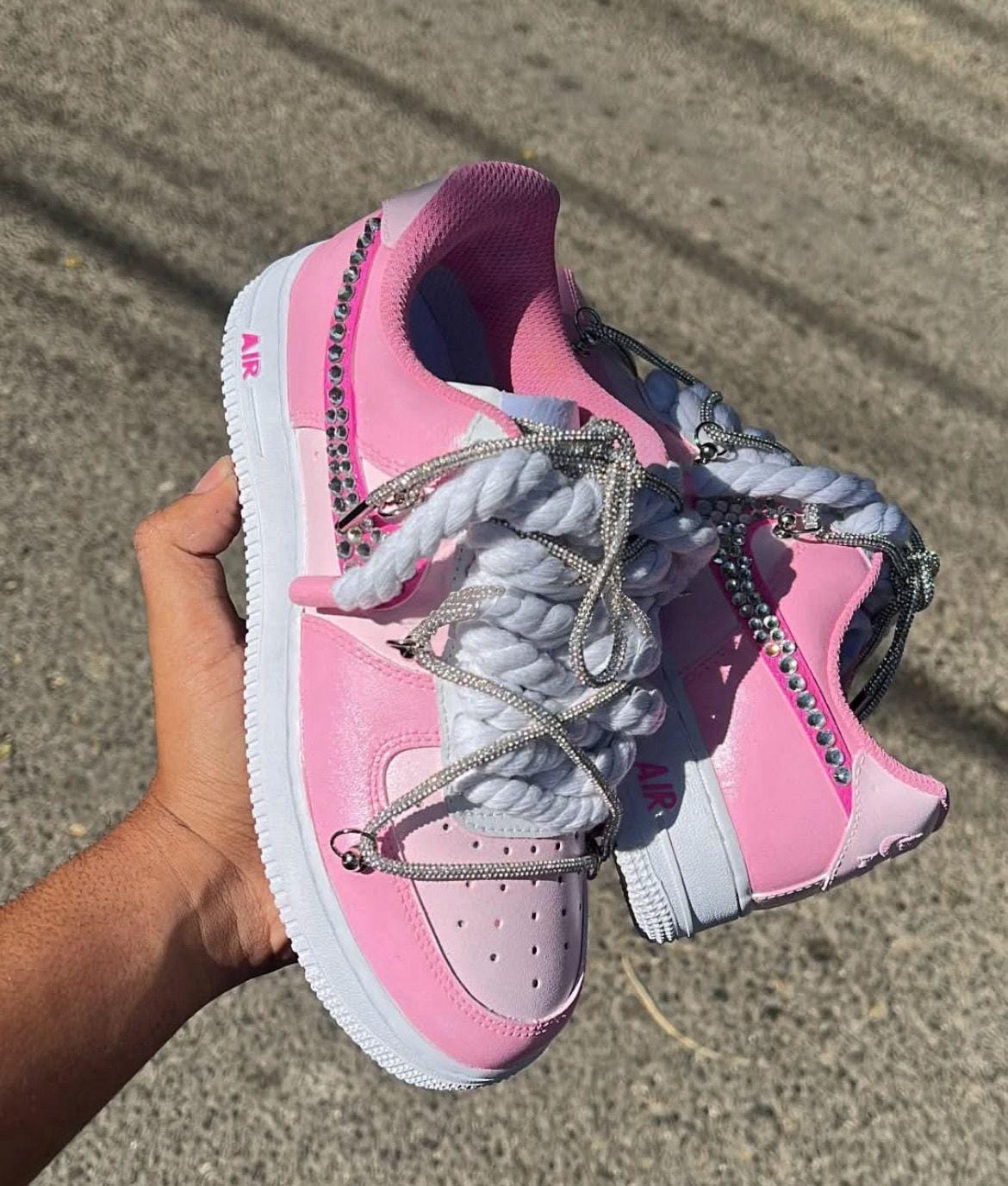 Pink nike swooshes