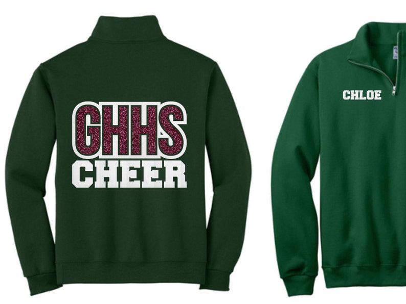 May include: A dark green fleece zip-up sweatshirt with a white and pink glitter design that says "GHHS CHEER" on the back and "CHLOE" on the front.
