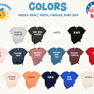 a collection of t-shirts in various colors, including white, black, red, and peach, as well as a navy blue t-shirt.