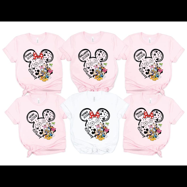 six pink t-shirts with Disney-themed designs, including Mickey Mouse and Minnie Mouse motifs, printed on them.