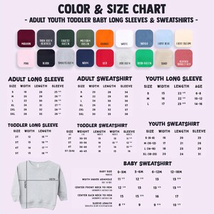 a baby sweater with a long sleeve and long sleeves