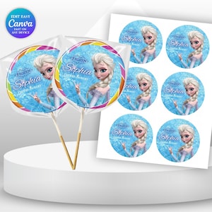 May include: Two lollipops and a sheet of stickers featuring the character Elsa from the movie Frozen. The lollipops have a colorful border and the name "Sophia" printed on them. The stickers have a blue background.