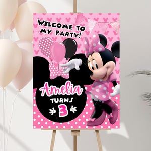 Cheerful Minnie Mouse Birthday Banner Mockup banner on stand white background and balloons on the left side Includes Balloons, Grass Motifs featuring Minnie Mouse Characters Perfect for Kids Party. Editable Canva Temple.