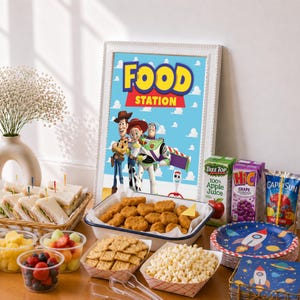 May include: A framed sign with the text FOOD STATION featuring Toy Story characters Woody, Jessie, Buzz Lightyear, and Forky. The display includes a basket of sandwiches, chicken nuggets, crackers, popcorn, fruit cups, and juice boxes.