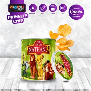 May include: A cylindrical Pringles chip container featuring a green jungle background with cartoon lion characters and the text Our Loin King Nathan 3. A separate circular lid displays the same text and character art, with several golden potato chips.