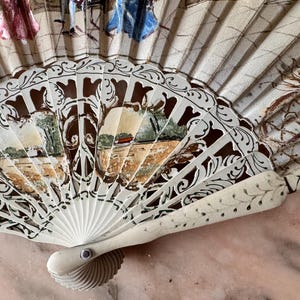 Antique Collectible Fan with Openwork Rods and Painted Romantic Scene