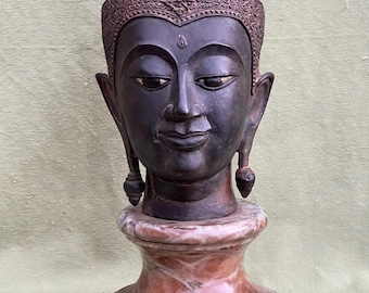 Patinated bronze Buddha head with marble base