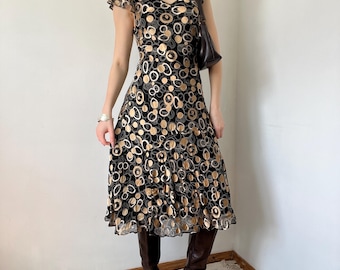 Vestido midi de seda vintage con lunares de estilo elegante