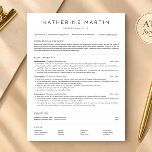May include: A professional CV template titled Katherine Martin with sections for professional overview, work experience, education, and skills. The document includes a gold metal clip, a gold pen, and a circular badge stating ATS friendly.