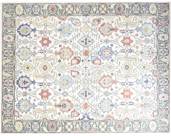 Floral Wool Rug: Ivory Base with Colorful Border