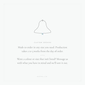 The image is a simple illustration of a bell with text providing information about custom orders.