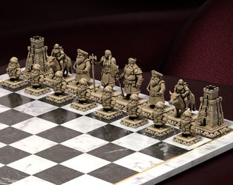May include: A fantasy-themed chess set featuring beige-coloured pieces depicting dwarves, riders, and castle towers. The chess pieces are arranged on a marble-effect chessboard, creating a visually appealing game setup.