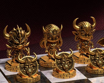 May include: Gold chess set with Viking-themed pieces. The set includes figurines of warriors and round pieces with Viking faces. The chess pieces are arranged on a checkered board, creating a visually striking display.