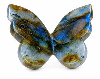 May include: A polished labradorite gemstone carved into the shape of a butterfly. The stone features a smooth, glossy surface with natural color variations including deep blue, earthy brown, gray, and black tones throughout the wings.