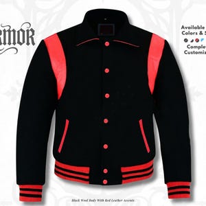 May include: A black wool varsity jacket with red leather accents. The jacket features red accents on the shoulders, pockets, cuffs, and waistband. The jacket has a button-up front and a classic collar. The text "NURMOR" is displayed at the top left.