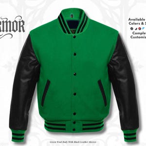 May include: A green wool varsity jacket with black leather sleeves, featuring a front button closure, black and green striped ribbed collar, cuffs, and hem. The text NURMOR is visible on the left, with additional text on the right.