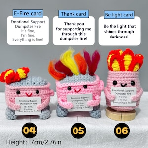 May include: Three handmade crochet figures, each with a pink body, gray lid, and colorful accents. Each figure holds a card with text. The height is 2.76 inches. The figures are labeled with the numbers 04, 05, and 06.