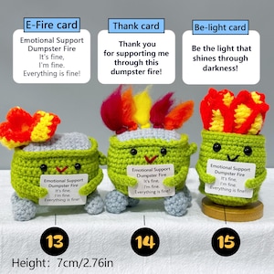 May include: Three crocheted figures, each with a green body, gray top, and a different colored flame. Each figure holds a card with text: "Emotional Support Dumpster Fire." Height is 2.76 inches.
