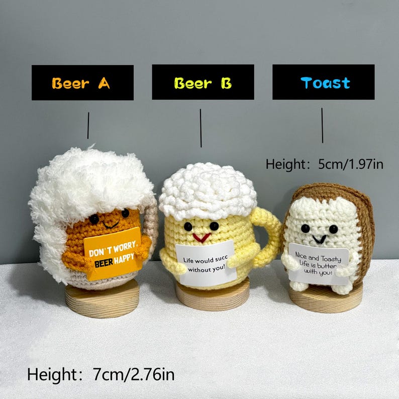 May include: Three handmade crochet items: a beer mug, a beer, and a toast. The beer is yellow with white foam, the beer has a white foam, and the toast is brown. Each has a smiling face and a small sign. The beer is 2.76 inches tall, and the toast is 1.97 inches tall.