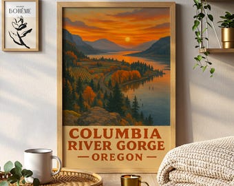 May include: Framed art print of the Columbia River Gorge in Oregon. The landscape features a river winding through a valley with colorful autumn trees and mountains under a sunset sky. Text at the bottom reads "COLUMBIA RIVER GORGE - OREGON".
