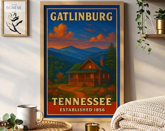 May include: A framed print featuring a vintage travel poster for Gatlinburg, Tennessee. The artwork depicts a cabin nestled in a mountain landscape under a sunset sky. The text "Gatlinburg Tennessee Established 1856" is displayed in gold and white.