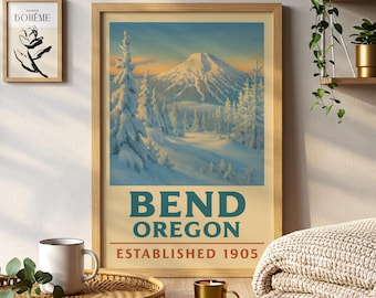 May include: Framed art print featuring a winter landscape with snow-covered trees and a mountain under a sunset sky. The print includes the text "BEND OREGON ESTABLISHED 1905" in a vintage style. A smaller framed art piece is also visible.
