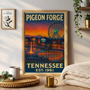 May include: A framed poster featuring a vibrant illustration of Pigeon Forge, Tennessee, with a Ferris wheel, fountains, and the text "Pigeon Forge Tennessee Est. 1961." The artwork is set against a sunset sky.