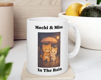 Mochi Holding An Umbrella Over Miso Mug, Cute Cat Coffee Mug, Feline Friends Gift, Purrfect for Cat Lovers, Adorable Mug for Every Occasion